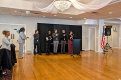 HMO-Workforce-Development-Youth-Employment-Program-staff-leading-audience-in-Pledge-of-Allegiance