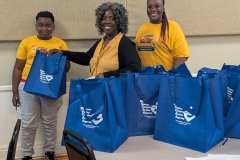 Civic engagement director, Darlene Mack Brown passed out MVCAA goody bags for completion of financial literacy assignment at site