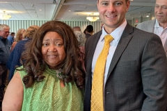 South-Utica-resident-Michelle-Laguerre-converses-with-her-Councilman-Joe-Betar-over-fixing-potholes-in-her-neighborhood-at-AG-James.-soiree-in-Yorkville